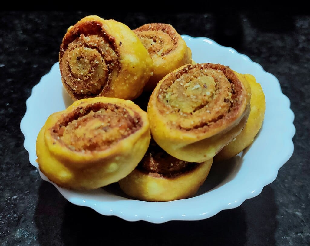 Things to Buy From Pune Trip - 10 Famous Items That Reflect the Soul of Pune 7 things to buy from pune, things to buy from pune trip, best things to buy from pune, famous things to buy in pune, pune shopping items, pune souvenirs, shopping in pune, pune local products, pune traditional items, what to buy from pune, pune famous shopping items, maharashtrian handicrafts pune, kolhapuri chappals pune, paithani sarees pune, puneri pagdi, bakarwadi pune, chitales bakarwadi, pune street shopping, laxmi road shopping pune, tulsi baug shopping pune